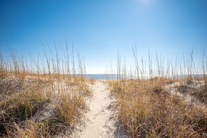 On the beach - Fairwinds: Inviting Oceanfront Home Built to Entertain (Caswell Beach)