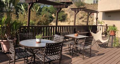 Relax On The Spacious Deck and Enjoy The Hollywood Sign and Lush Canyon Views