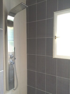 Shower, hair dryer, towels, soap
