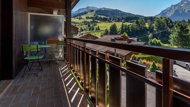 A balcony with a view of a mountain landscape. - Village Center, Near Ski Slopes, Courses, and Shops (La Clusaz)
