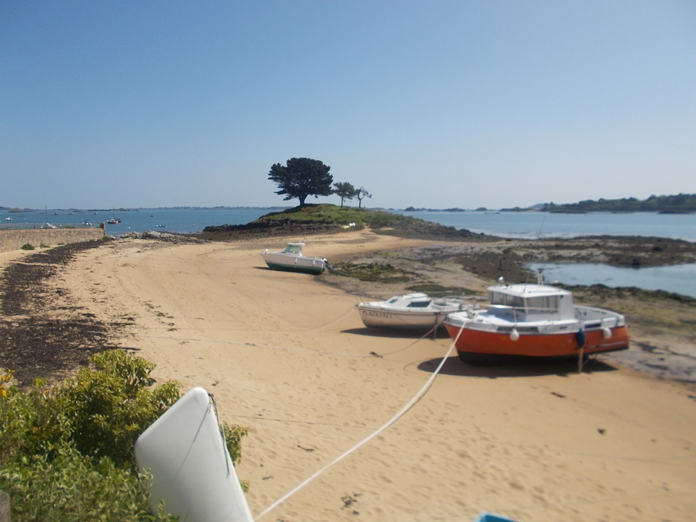 On the beach, sun loungers