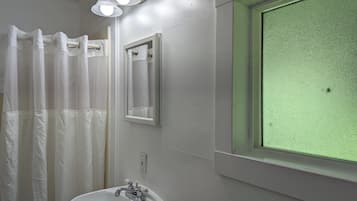 Shower, towels, soap, toilet paper