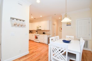 Enjoy cooking and dining in this well-equipped kitchen with a dining area.