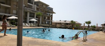 Prestigia plage des nations seen on sea and swimming pool high standing apartment