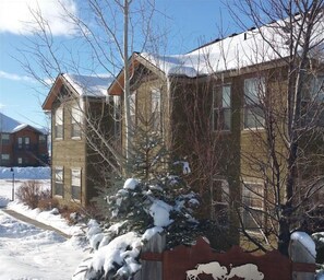 Experience the charm of Buffalo Junction at this traditional hotel, featuring a welcoming entrance and cozy windows.
