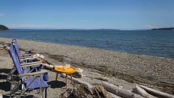 On the beach, sun loungers