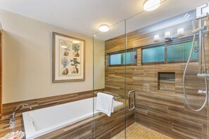 Bathtub, hair dryer, towels, soap