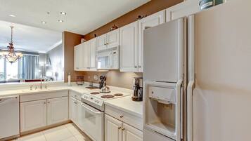 Fridge, microwave, coffee/tea maker, toaster