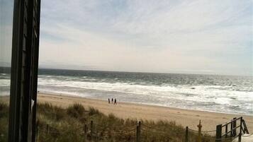 On the beach, sun-loungers, beach towels