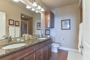 Combined shower/bathtub, hair dryer, towels, soap