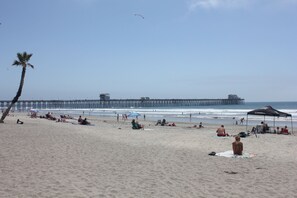 On the beach, sun loungers, beach towels