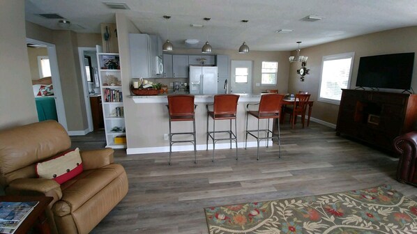 Smart TV, DVD player, books, video library