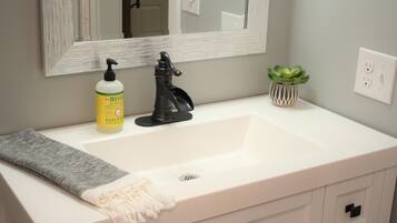 Hair dryer, towels, soap, shampoo