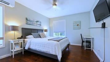 1 bedroom, desk, iron/ironing board, travel crib