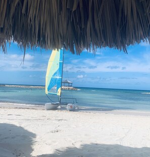 On the beach, sun loungers, beach towels - "Sought-After" Luxurious 2100 sq ft Oceanfront Private Residence, in a Resort (Montego Bay)