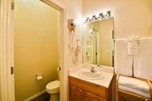 Bathtub, hair dryer, towels