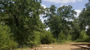 An archaeological site with stone structures and a central stone pillar. - Cabin for two on 160 Acres,less than 20 min from Choctaw Casino Durant OK (Bokchito)