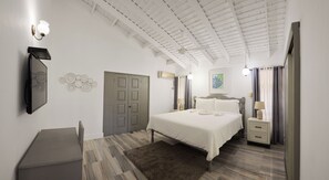 Une chambre moderne avec un lit, des tables de chevet, un bureau et un ventilateur de plafond.