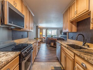 Fridge, microwave, oven, stovetop - Rustic condo w/private balcony, fireplace and close access to lifts - Stillwater Getaway (Gallatin Gateway)