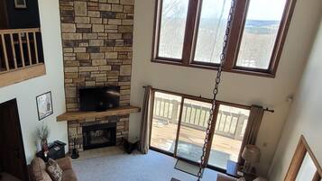 TV connectée, cheminée, jeux vidéo, lecteur de DVD