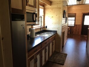 Fridge, microwave, coffee/tea maker, toaster