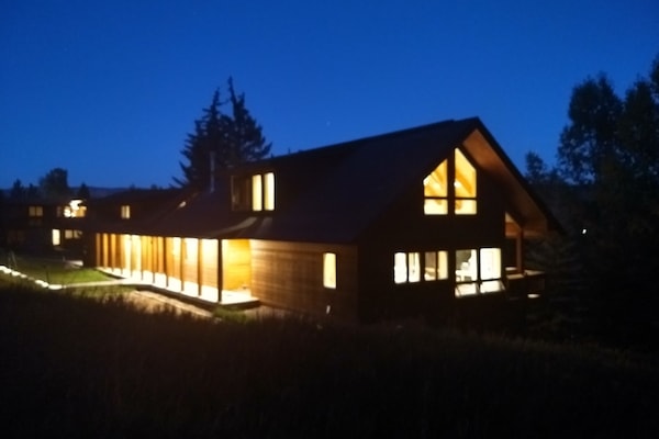 Beamed high ceilings - warm and welcoming interior.