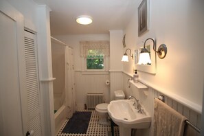 Combined shower/tub, hair dryer, towels, soap
