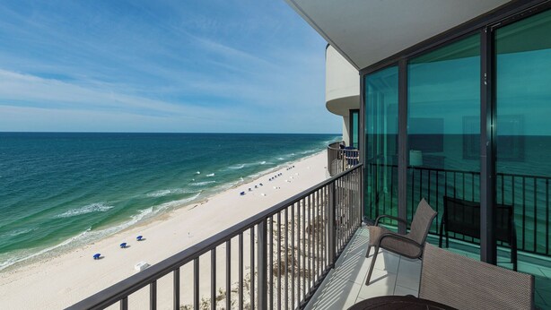 A balcony with a view of a beach and ocean. - Phoenix IX PREMIUM 2 Bedroom **BEACH FRONT!!!** (Orange Beach)