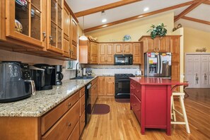 Dishwasher, coffee/tea maker, cookware/dishes/utensils, ice maker - Woodlands Wonder: Cute Oak Island Cottage with Private Pool Welcomes Nightly Res (Oak Island)