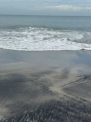 A beach with waves approaching the shore. - Our Still Quiet Place on the Pacific Ocean in Panama. (Playa Coronado)