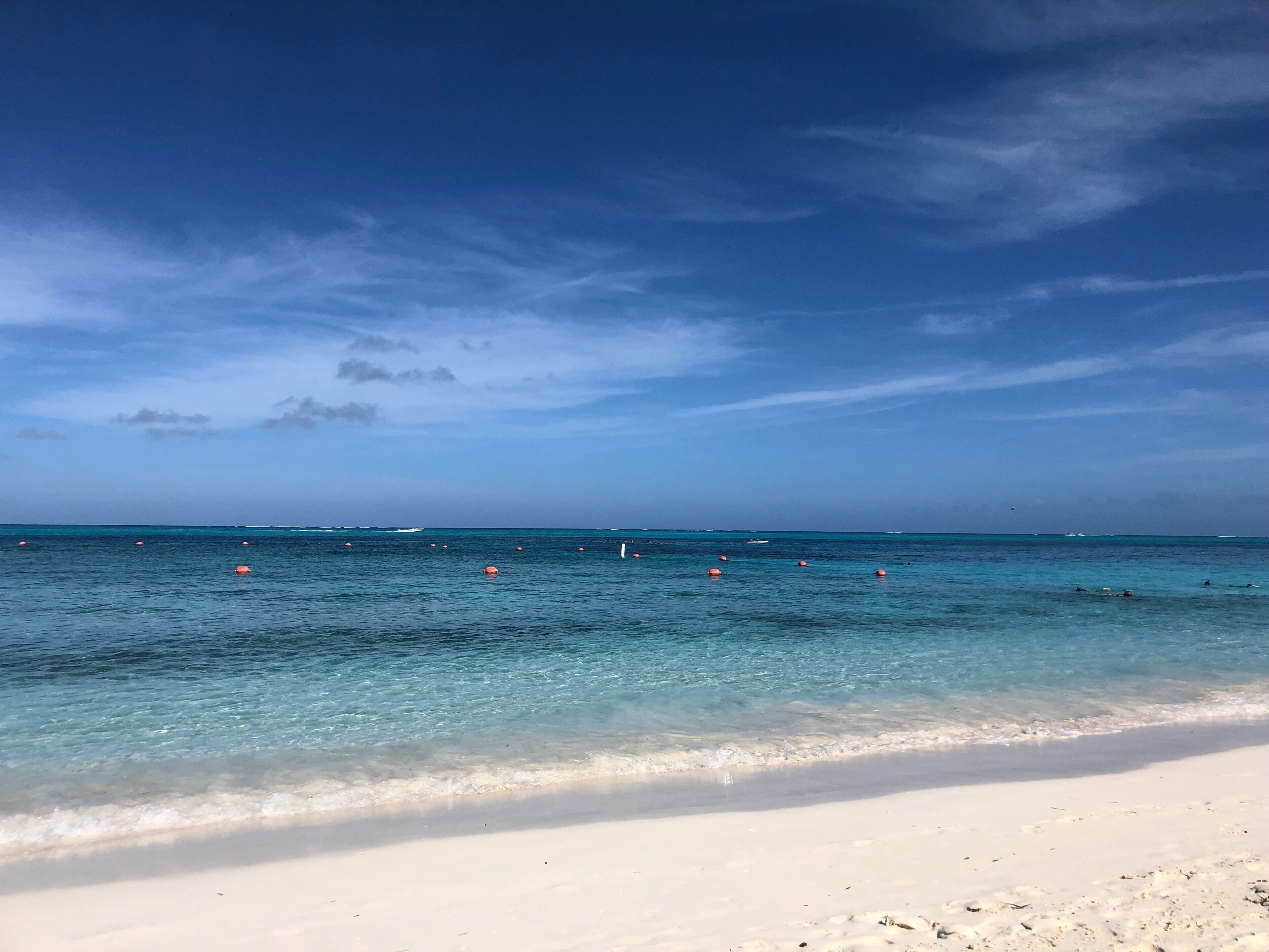 On the beach, sun-loungers, beach towels, beach bar