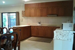 3- Bedroom Private Pool Villa | Private kitchen | Full-size fridge, microwave, stovetop, coffee/tea maker