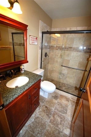 Combined shower/tub, hair dryer, towels, soap