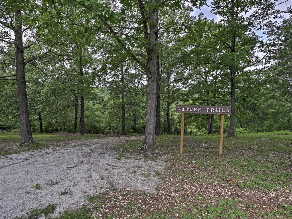 A sign for Nature Trails in a wooded area.
