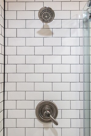 Combined shower/tub, hair dryer, towels, soap