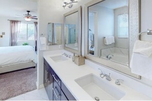 Combined shower/tub, hair dryer, towels, soap