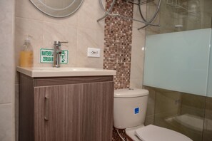 Shower, hair dryer, towels