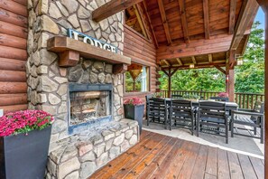 Outdoor wood burning fireplace