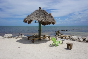 On the beach, sun loungers