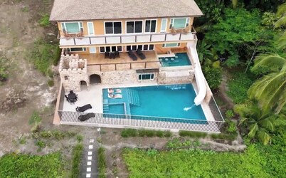 Costa Rica BEACH Castle with WATERSLIDE, WATERFALL, 2 Pools on SANDY BEACH 12ppl