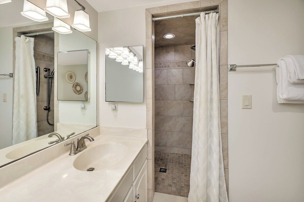 Beach Club 101 - Primary Bathroom Vanity and Walk in Shower