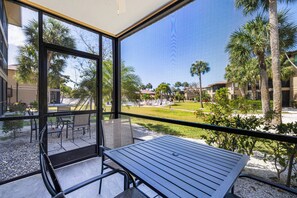 Outdoor dining - Blind Pass Condos at Bowman's Beach C103 on beautiful Sanibel Island (Sanibel Island)