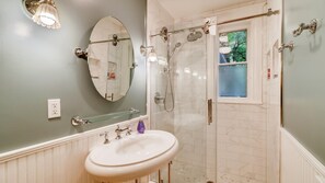 Combined shower/tub, hair dryer, towels, soap