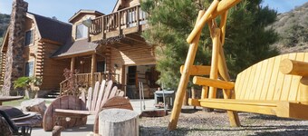 Luxury Log Home Resort, 10 bedrooms on 22 Acres, surrounded by its own mountains