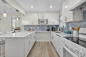 Fridge, microwave, oven, stovetop - Blind Pass Condo A103 on beautiful Sanibel Island (Sanibel Island)