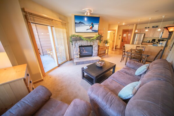 Premium Condo, 1 Bedroom, Balcony, Resort View (Buffalo Lodge 8361) | Living area | Flat-screen TV, fireplace, DVD player