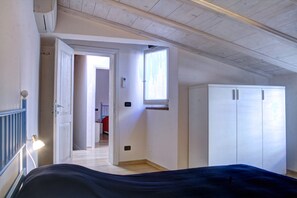 2 bedrooms, in-room safe, iron/ironing board, travel cot