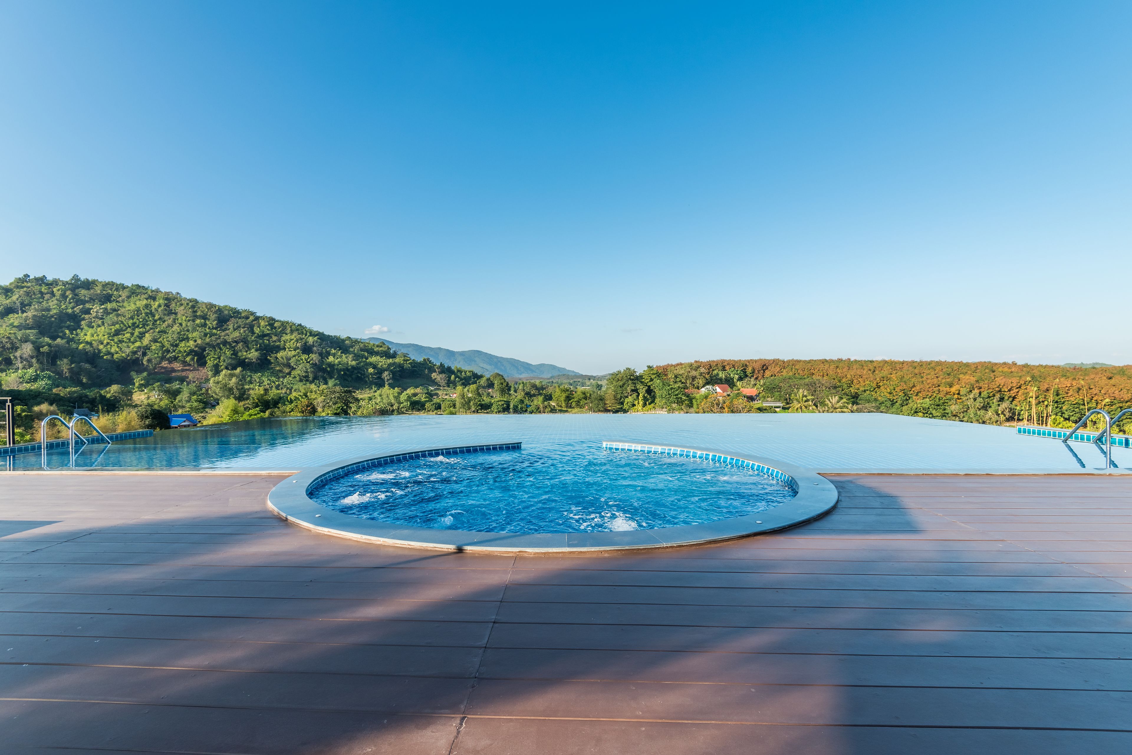 Outdoor pool, open noon to 9:00 PM, pool umbrellas, pool loungers