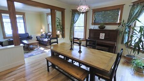 Dining area with front living room in background