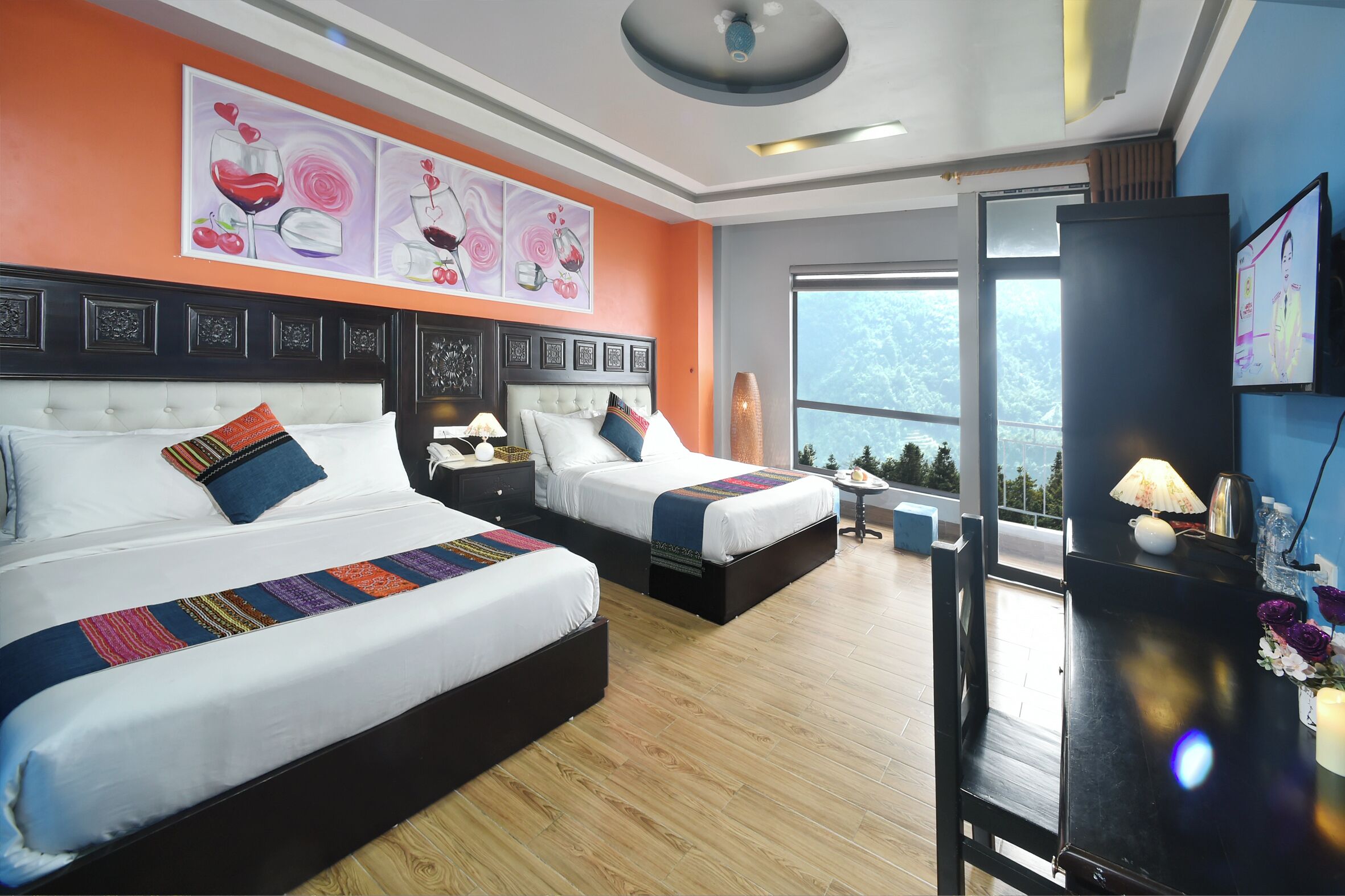 family room | 1 bedroom, minibar, in-room safe, desk